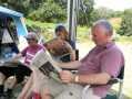 Sunday papers at family camp 2003